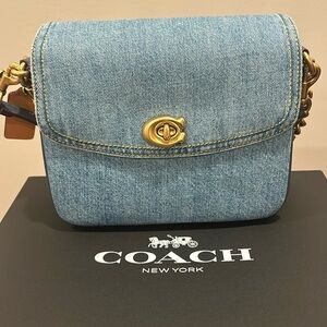 Worn once Coach denim Cassie